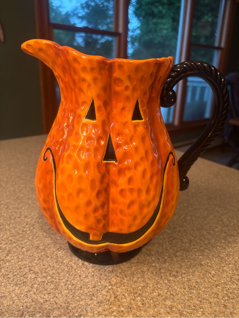 K&K Interiors Vintage Jack-O’-Lantern Ceramic Pitcher with Black Handle.